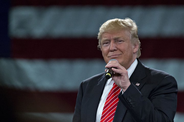 Trump pauses while speaking during a town hall event at the Tampa Convention Center in Tampa, Florida, US, on Monday, March 14, 2016