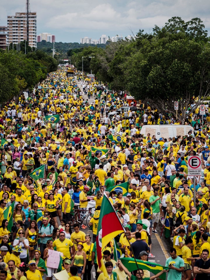 Nearly 2 million protestors participated in demonstrations across the against President Dilma Rousseff's embattled government on Sunday.