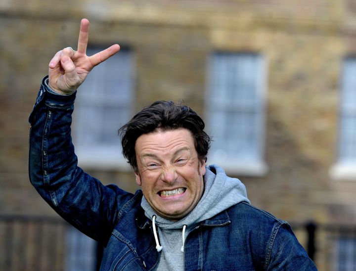 <strong>"We did it!": Jamie Oliver celebrates outside Westminster today after George Osborne's announcement of a tax on sugary drinks</strong>