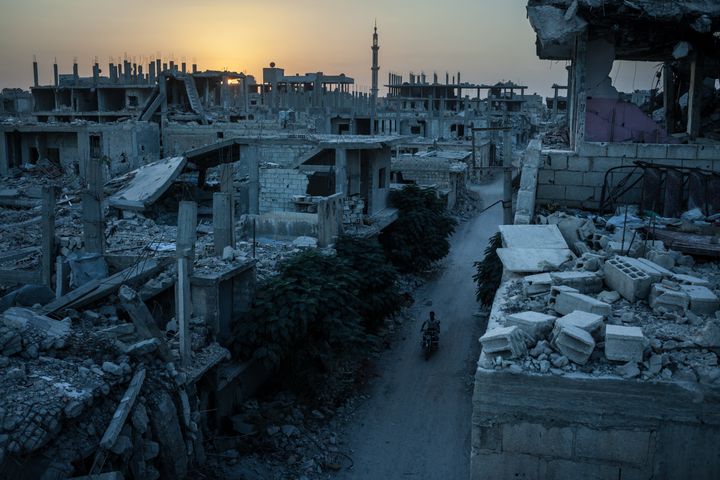 View of a heavily damaged neighborhood in Kobane, Syria, targeted by a series of US-led coalition airstrikes aimed at Islamic State members.