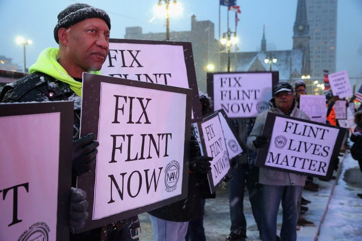 Demonstrators outside the historic Fox Theater before the GOP presidential debate on March 3, 2016 in Detroit, Michigan.