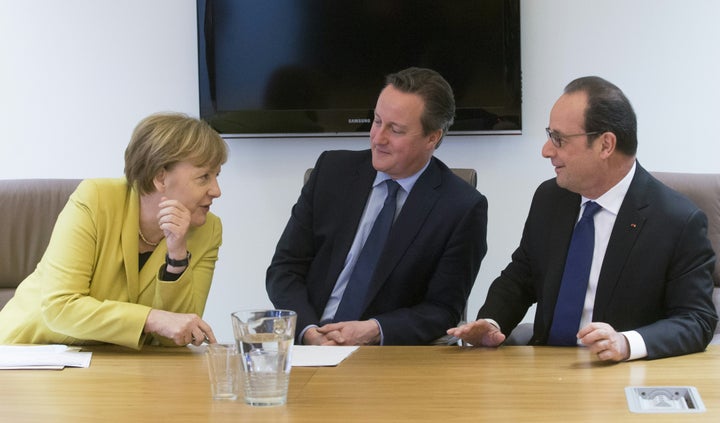 German Chancellor Angela Merkel talks with Britain Prime minister David Cameron and French President of Republic Francois Hollande during two-days European Union leaders summit in Brussels, on March 18, 2016.