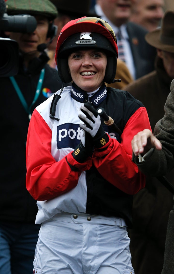 Former British olympic cycling star Victoria Pendleton applauds the winner on Friday