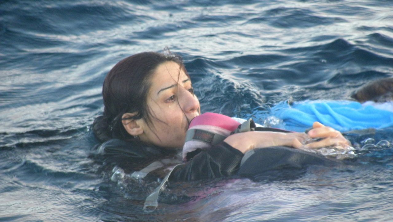 Rukhsan Muhammed, who used her suitcase to keep her 1-year-old son, Mirwan, from drowning. Despite her efforts, the boy fell off the suitcase and was lost amongst the waves