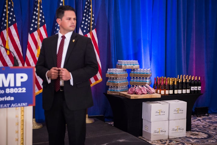 A display including Trump branded wine, champaign, water and steaks is seen before a campaign press conference event at the Trump National Golf Club in Jupiter, Florida, March 8, 2016..