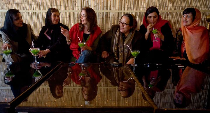 Afghan businesswomen, including Mina Sherzoy (far right), gather in 2009 to discuss new laws in that country.