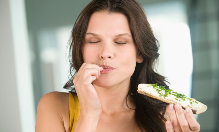 Hearing your own food while chewing can reduce how much you eat, scientists say.