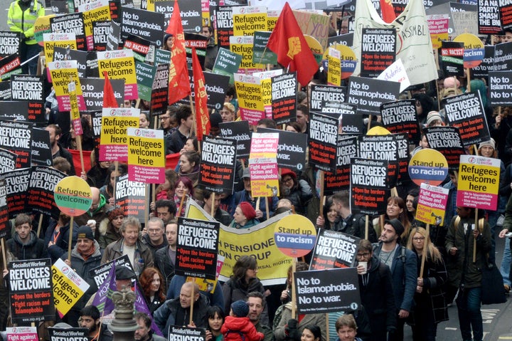 Campaigners from the Stand Up to Racism protest through Regent Street in London