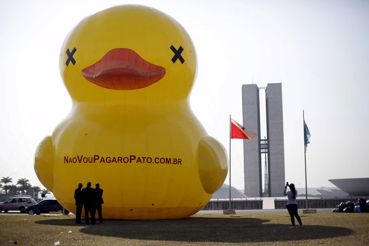 The gigantic, inflatable yellow duck is fast becoming a symbol of the Brazilian rich's anger towards President Dilma Rousseff.