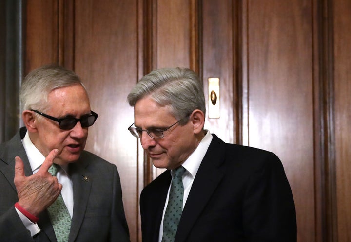 Merrick Garland (right), here with Senate Minority Leader Harry Reid (D-Nev.), will need all the advice he can get to convinc