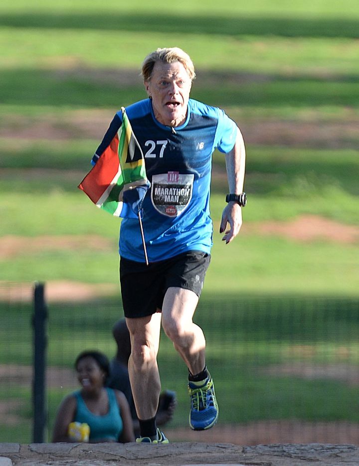 Comedian Eddie Izzard completes his 27th marathon at the government's Union Buildings in Pretoria, South Africa
