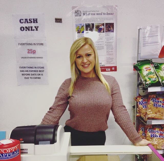 Danks behind the counter in the newly-opened St Austell store