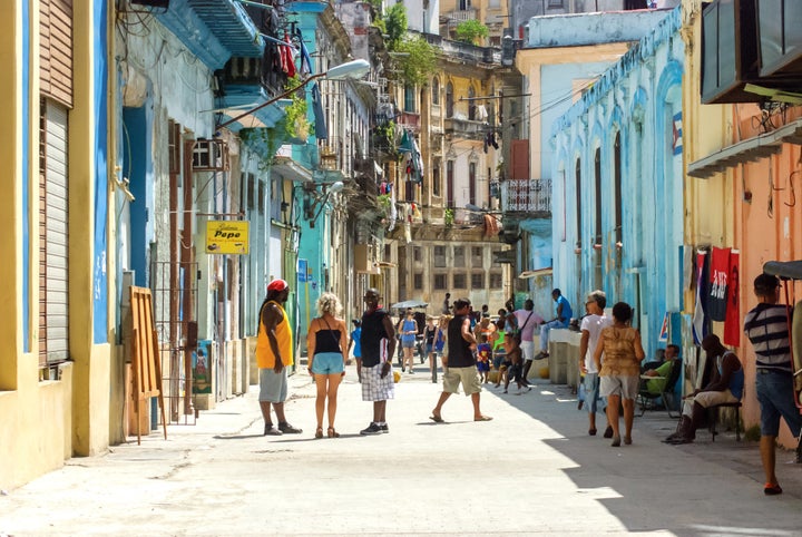 Locals on San Miguel street in Old Havana.