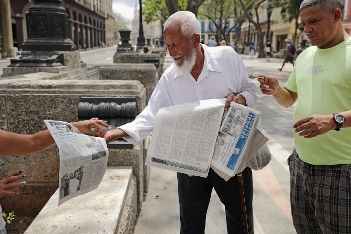 A man sells copies of Cuban state newspaper Juventud Rebelde in Havana on March 20, 2016. Cuba's state-controlled press celebrated President Barack Obama's visit as a huge event for the nation.