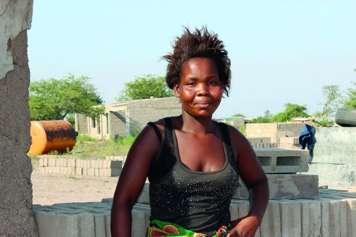 Amelia stands in Boane, on the outskirts of Maputo, Mozambique.