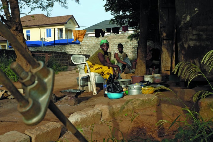 Doris Oparebia sits in her yard in Accra, Ghana.