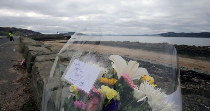Flowers left at the scene at Buncrana Pier in Co Donegal