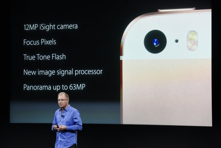 Apple Vice President Greg Joswiak shows off some of the iPhone SE's specs at the company's keynote in California.