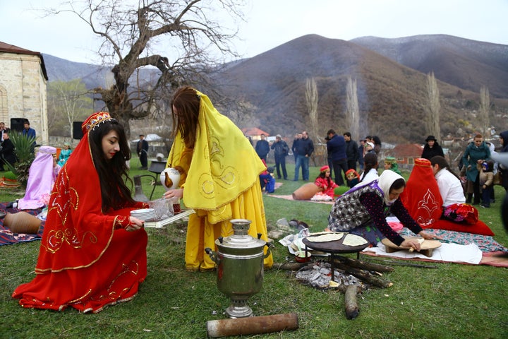 People attend Nowruz celebrations, the traditional Iranian festival of spring which starts at the exact moment of the vernal equinox, in Baku, Azerbaijan on March 21, 2016.