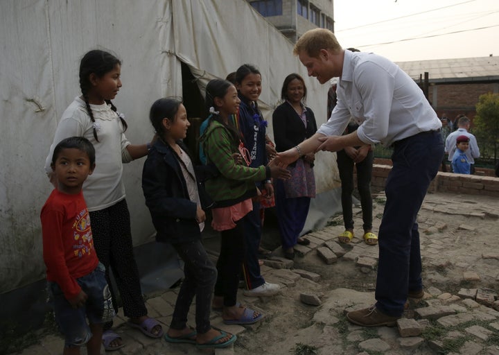 The prince visits Nepalese families displaced by the 2015 earthquakes at a makeshift camp in Bhaktapur.