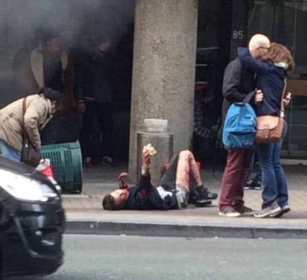 Brussels Attacks: Astonishing Picture Captures Couple Embracing After Metro Station And Airport