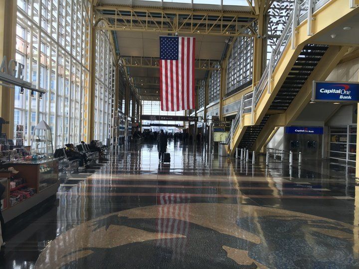 The D.C. airport appeared calm, though with security visibly beefed up in some areas following the deadly Brussels attacks.