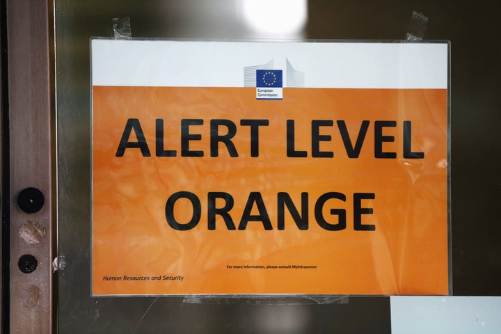 An "Alert Level Orange" sign is seen on an EU Commission building following terrorist attacks in Brussels, March 22, 2016.