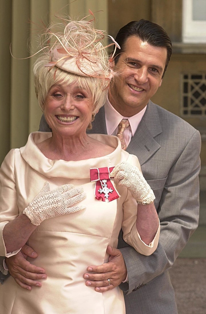 <strong>Babs (seen here with her husband Scott) was previously awarded an MBE in 2000</strong>
