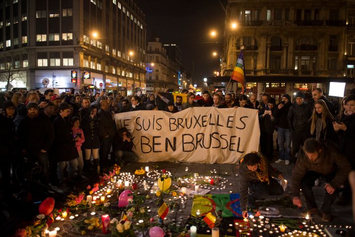 People gather in Brussels' Bourse square on Tuesday night