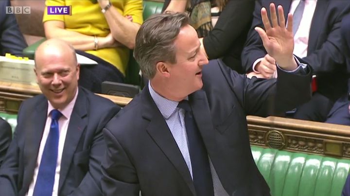 David Cameron raises his hand to show he is a 'core supporter' of Jeremy Corbyn