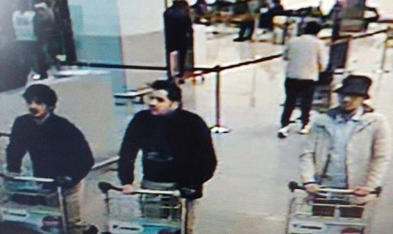 The three men are seen moments before the airport attack
