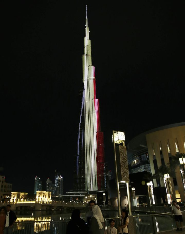 Burj Khalifa, the world's tallest building, is illuminated in colors of the Belgian flag in tribute to victims of the Brussels terror attacks.