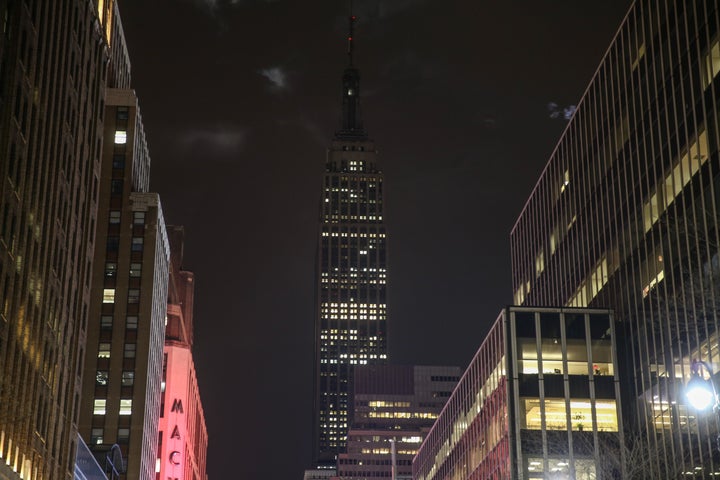 Empire State Building's Top Deck is seen after its lights were turned off to pay respect to Belgium after Brussels Terror attacks.