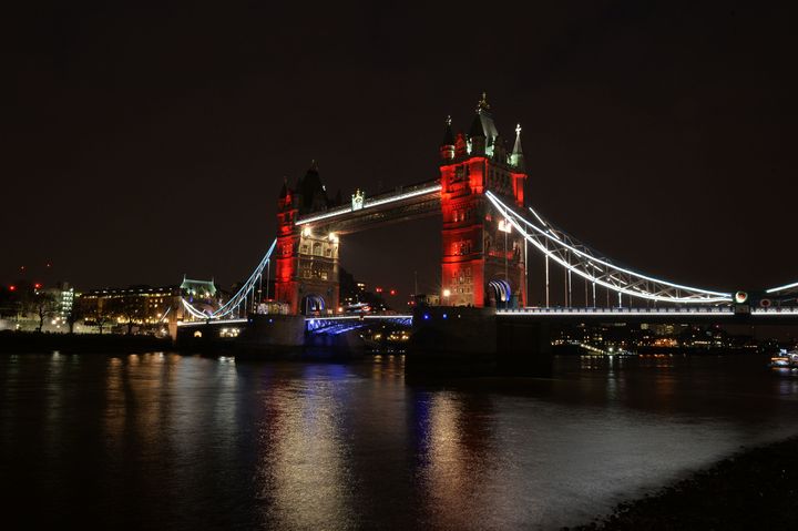 Tower Bridge in central London lit in the colours of the Belgium flag as a tribute following Tuesday's terrorist attacks in Brussels
