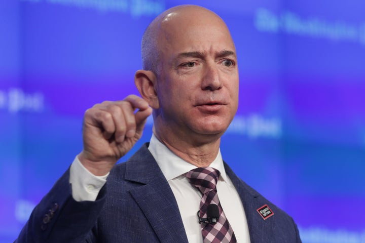 Amazon chief executive and founder Jeff Bezos. His company said Wednesday that men and women employees are paid fairly.