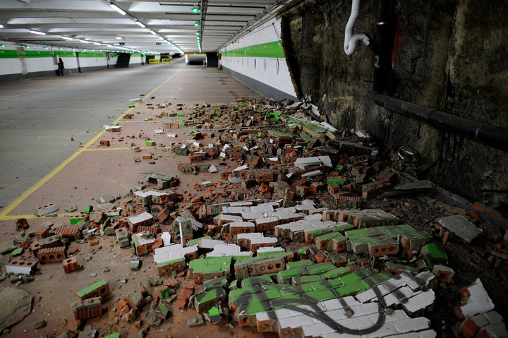 Belgium reeled from the deadliest attacks in its history on Wednesday, while many questions remain about how the attacks were carried out. Above, bricks fallen from a wall following the bombing at Maelbeek metro station.