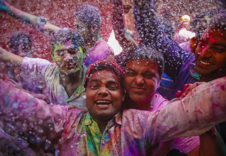 Indians take part in the Holi celebrations in Vrindivan, India on March 24, 2016.