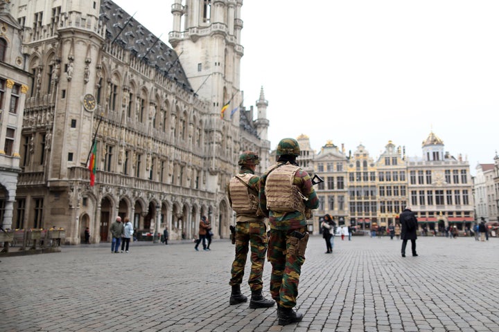 A U.S. counter-terrorism official said he tried to arrange meetings in Belgium shortly after the November Paris attacks, but his Belgian counterparts were not welcoming. Belgian soldiers patrol in the Grand Place of Brussels on March 24, 2016.