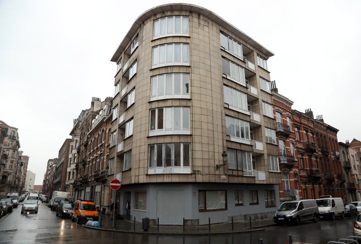 Belgian police arrested a suspect believed to be carrying explosives in a raid on Friday, days after several attackers target