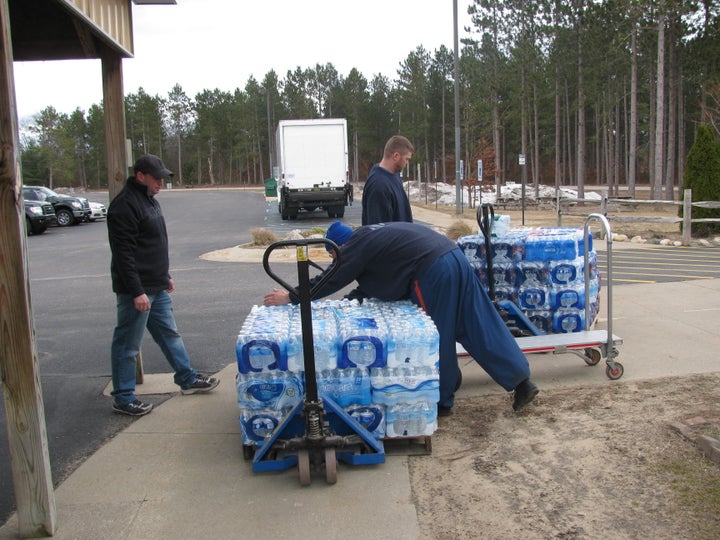 Prisoners at Pugsley Correctional Facility load water donated through the contest. 