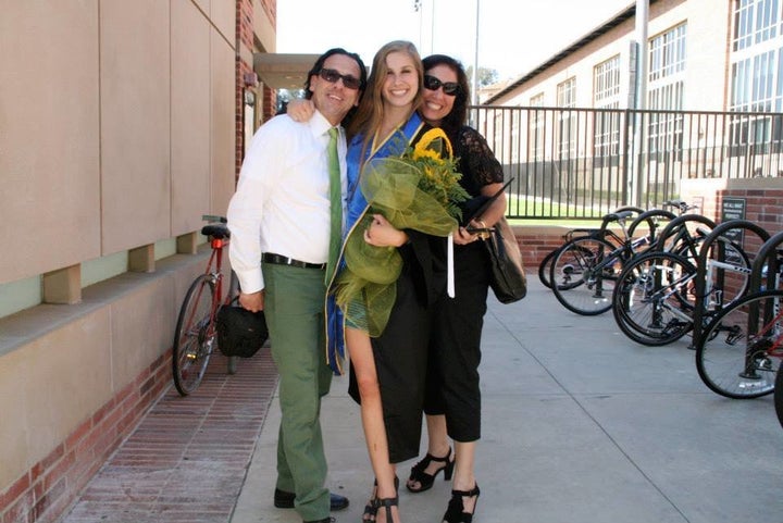 Nile Cappello and her parents at her college graduation.