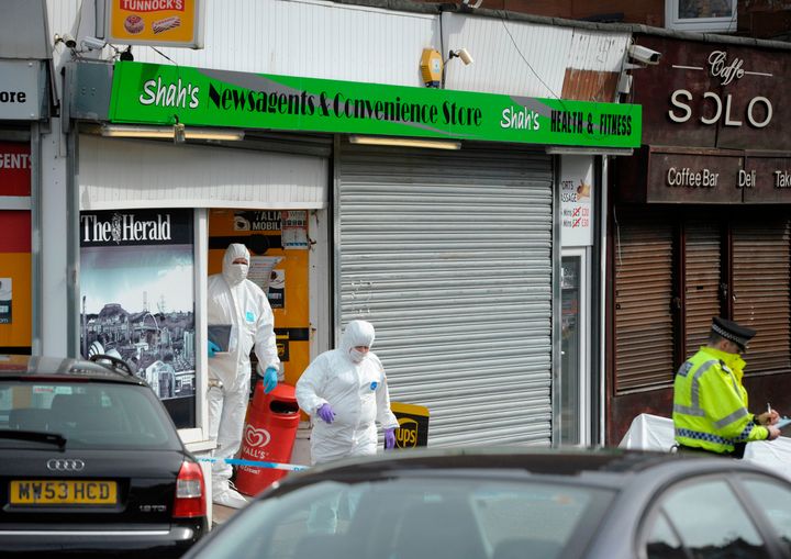 Police on Minard Road, Shawlands, Glasgow, investigating the death of popular shop keeper Asad Shah following an incident at his shop. March 25, 2016