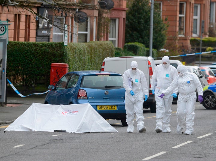 Police on Minard Road, Shawlands, Glasgow, investigating the death of popular shop keeper Asad Shah following an incident at his shop. March 25, 2016