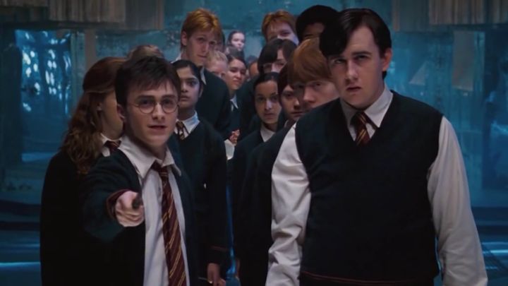 Daniel Radliffe as Harry Potter and Matthew Lewis as Neville Longbottom. 