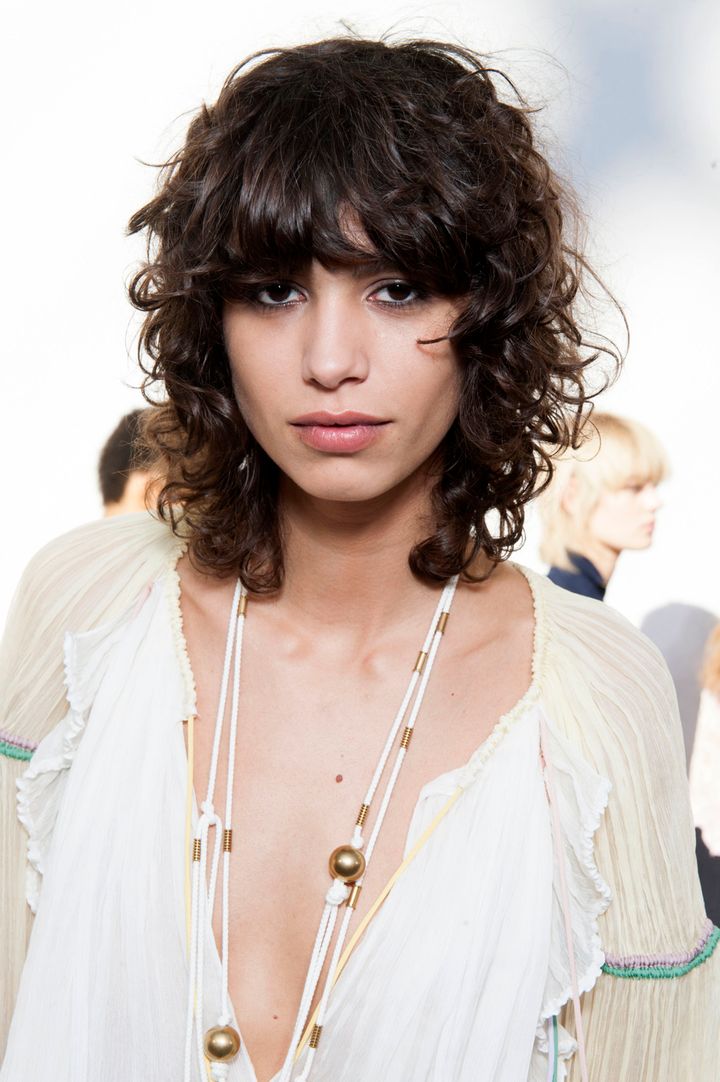 Feathery, curly bangs like model Mica Arganaraz's work best on square-shaped faces.