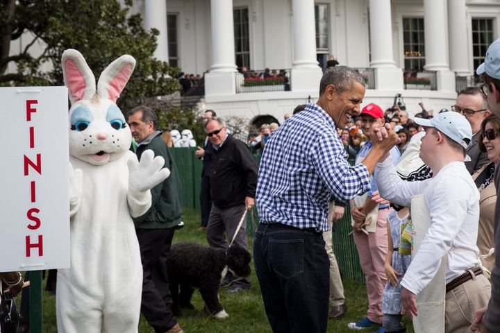 President Barack Obama shakes hands with an attendee during the annual White House Easter Egg Roll.