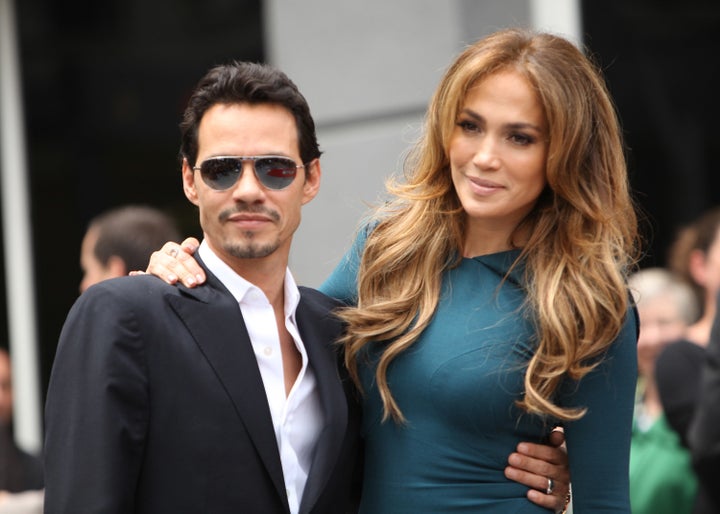 Marc Anthony and Jennifer Lopez attend the ceremony honoring Simon Fuller with a Star on The Hollywood Walk of Fame held on M