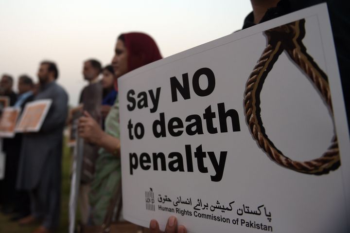 Activists from the Human Rights Commission of Pakistan carry placards during a demonstration to mark International Day Against the Death Penalty in Islamabad on Oct. 10, 2015. Pakistan has executed at least 332 people since bringing back its death penalty in 2014.