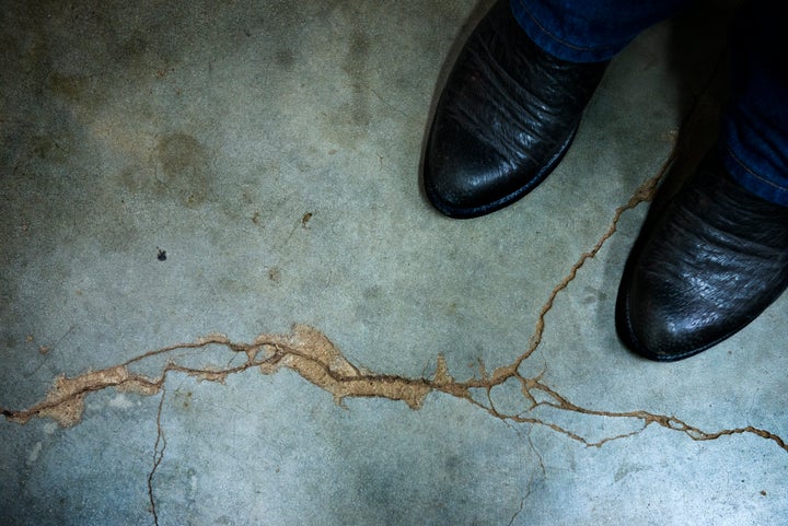 Gary Landra stands on a crack across his basement floor that he says was caused by an earthquake in Prague, Oklahoma. A new report from the USGS says that north-central Oklahoma has the country's highest risk of experiencing a damaging earthquake in 2016.