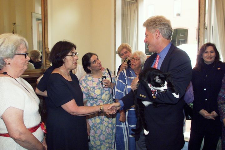 Former President Bill Clinton with Socks the cat.
